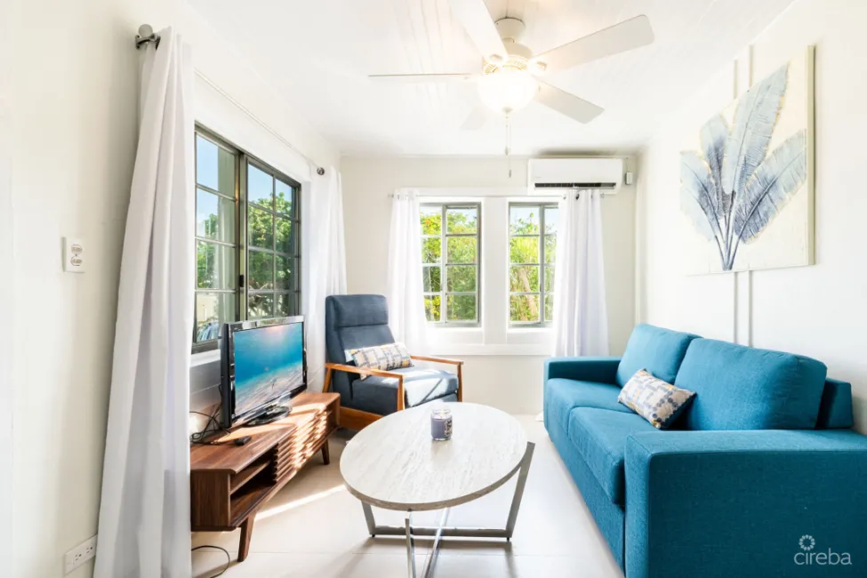 CHARMING OCEANVIEW COTTAGE ACROSS FROM THE SEA ON EXPANSIVE 0.89 ACRE LOT