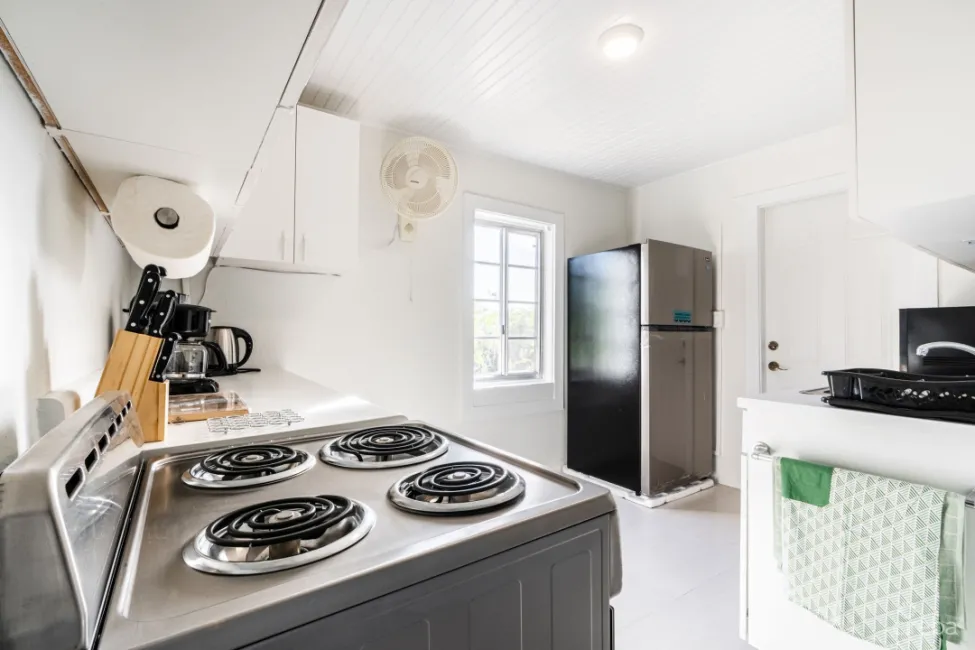 CHARMING OCEANVIEW COTTAGE ACROSS FROM THE SEA ON EXPANSIVE 0.89 ACRE LOT