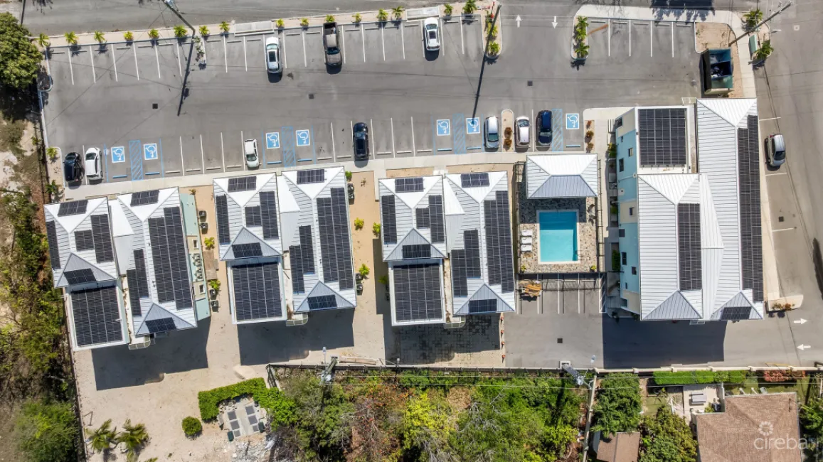 INCOME-PRODUCING RESIDENTIAL PORTFOLIO --4 STUDIOS IN WEST BAY
