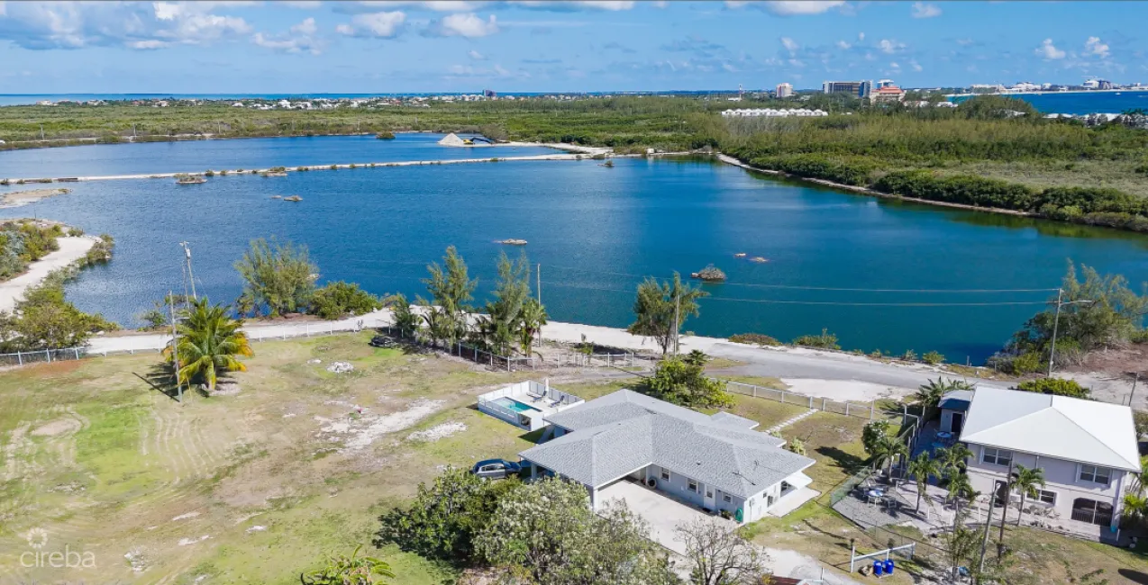 DEVELOPMENT LAND WITH RENTAL INCOME JUST OFF SMB CORRIDOR