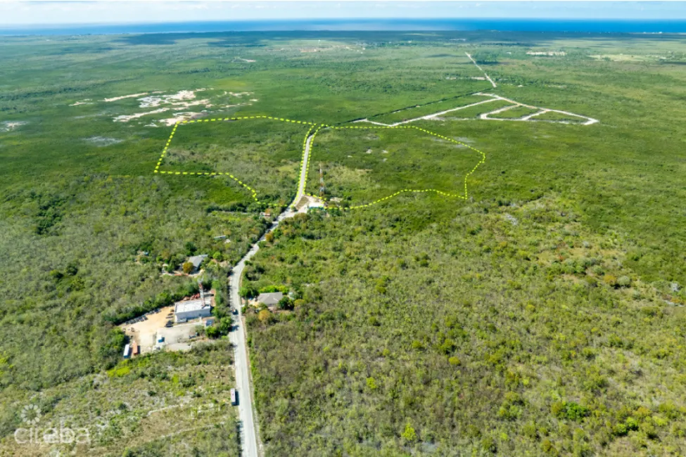 Parcel extends across both sides of High Rock Drive north of the junction with Sea View Road.