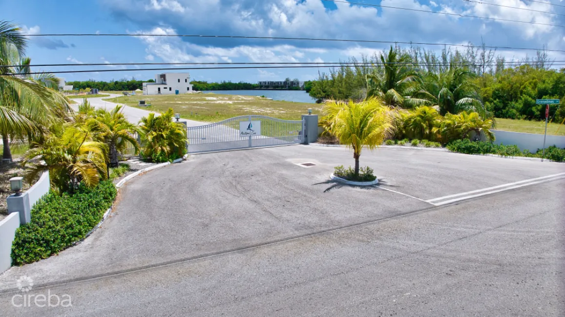 MUSTIQUE COVE LOT WITH DOC IN A PRIVATE GATED COMMUNITY