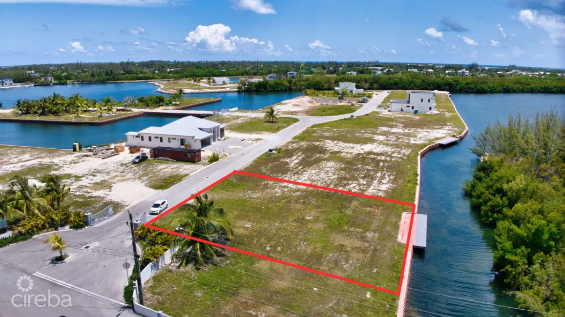 MUSTIQUE COVE LOT WITH DOC IN A PRIVATE GATED COMMUNITY