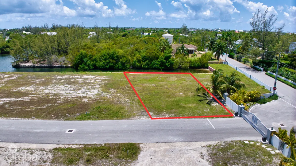 MUSTIQUE COVE LOT WITH DOC IN A PRIVATE GATED COMMUNITY