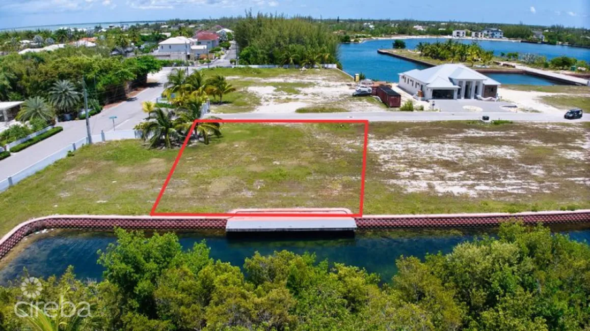 MUSTIQUE COVE LOT WITH DOC IN A PRIVATE GATED COMMUNITY