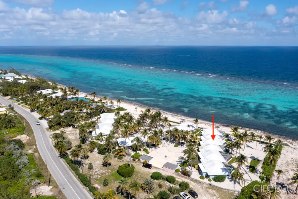 CAYMAN KAI SEALODGE #13 BEACHFRONT CONDO WITH IMPRESSIVED RENTAL HISTORY