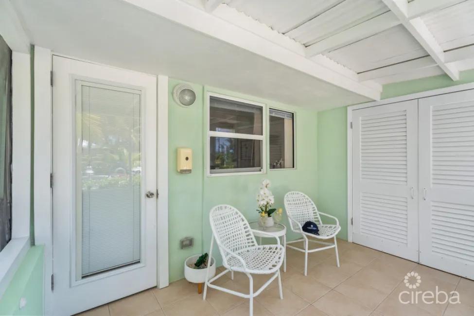 CAYMAN KAI SEALODGE #13 BEACHFRONT CONDO WITH IMPRESSIVED RENTAL HISTORY