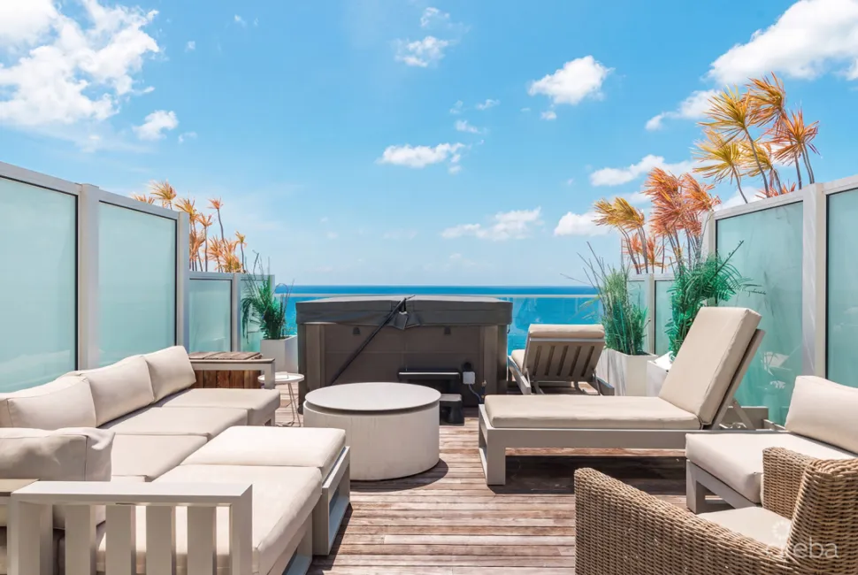 THREE-LEVEL OCEANFRONT FIN PENTHOUSE  #30 PLUS 2 GARAGES