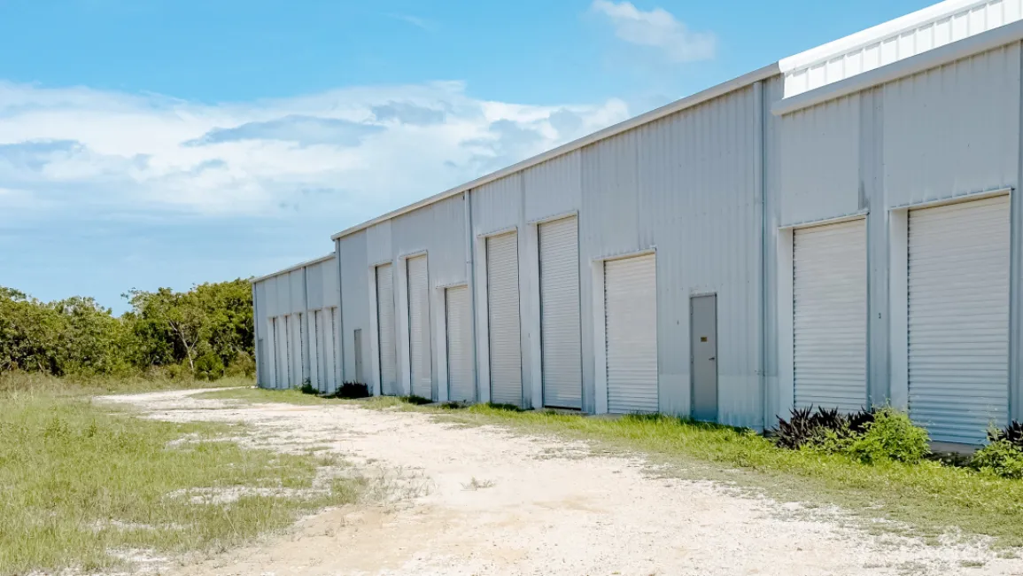 LITTLE CAYMAN WAREHOUSE (20 UNITS) AND LAND SUB-DIVISION  13 LOTS