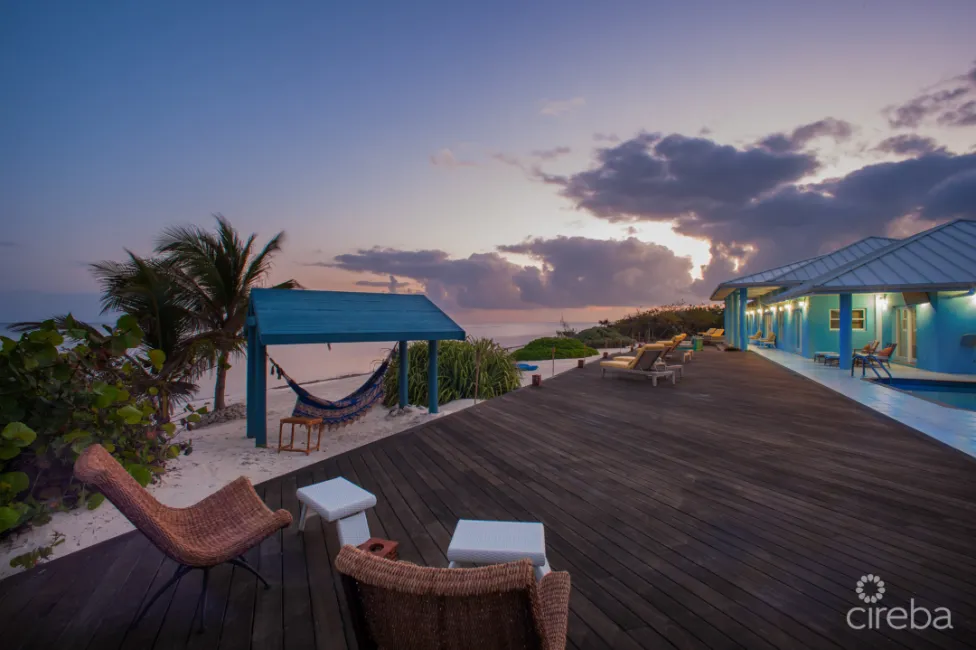 LITTLE CAYMAN BEACHFRONT HOME WITH 2 LOTS AND POOL